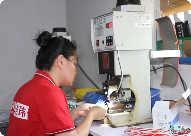 Production management team overseeing commercial electric fryer manufacturing operations