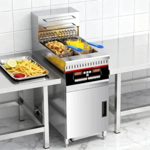 Commercial deep fryer with built in filtration system used in restaurant kitchen